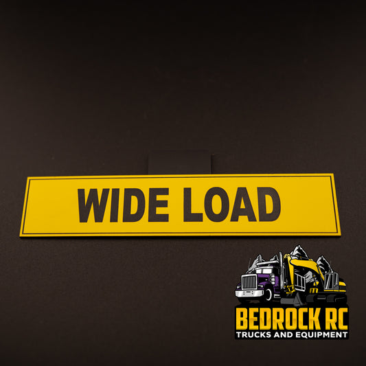 Bedrock Built Wide Load Sign for 1/14 scale RC trucks – laser-etched hard plastic sign, 152mm x 32mm, glued or bolted for realistic heavy haul builds.